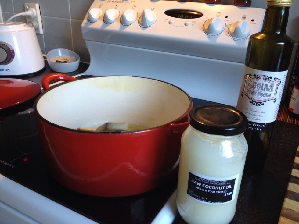 Heat your coconut and olive oil in a good pot. Red pots cook faster ;o)