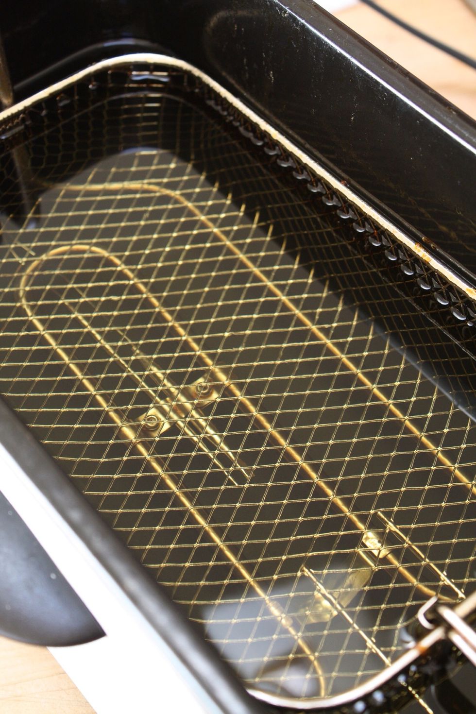 Heat your fryer to 375\u00b0 F.