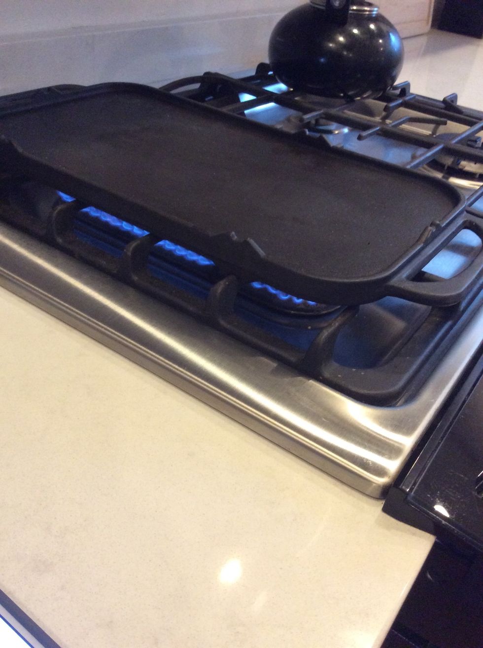 Heat your griddle to medium and spray it with coconut oil.