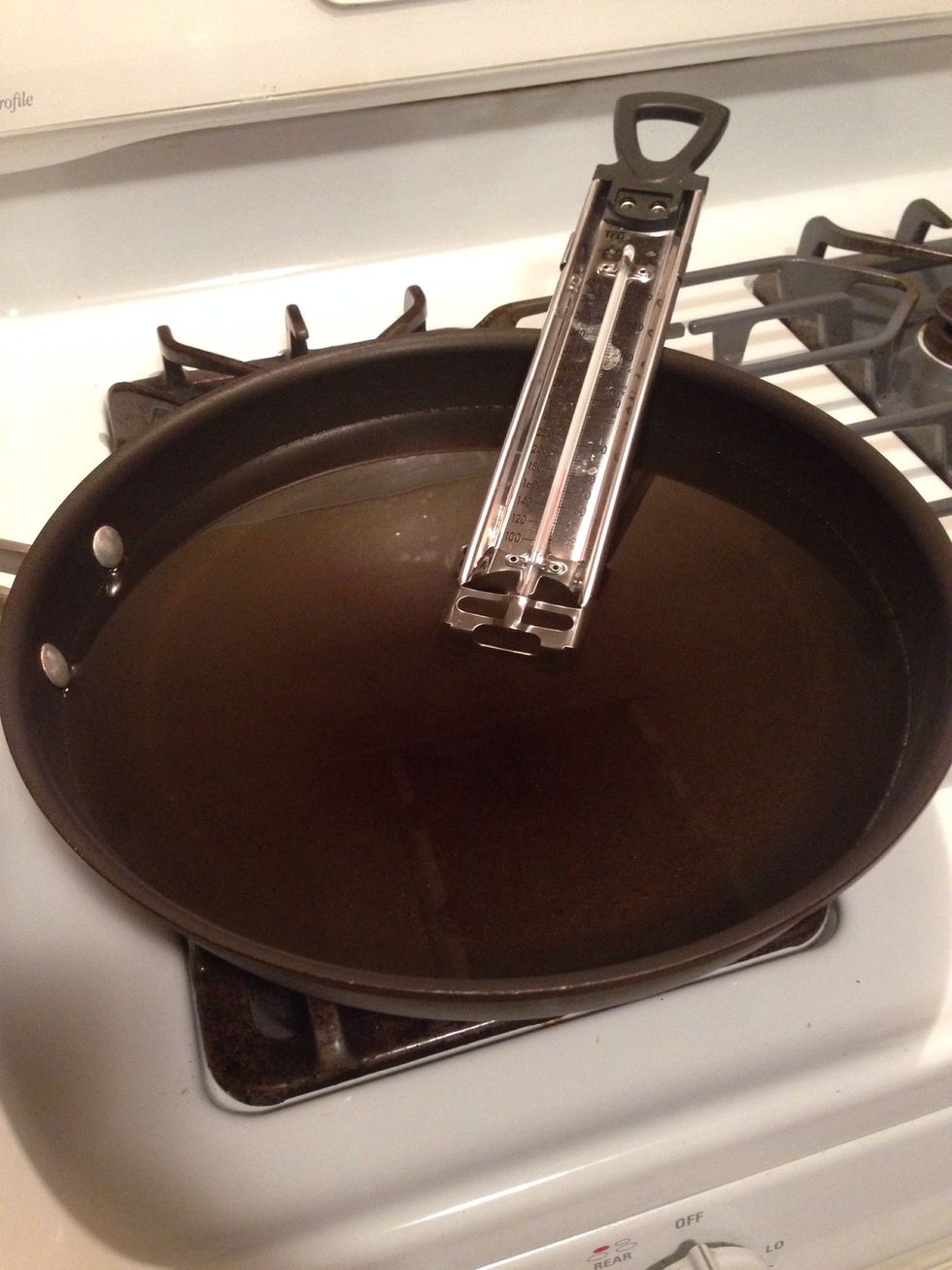 Heat your oil to about 285 F. I don't have a deep fryer, so I use a deep pan and a candy thermometer to gauge my temp.