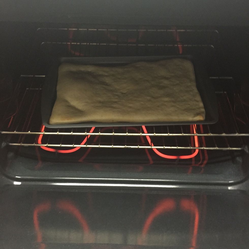 Heat your pizza dough just to give it a little firmness for a minute or two