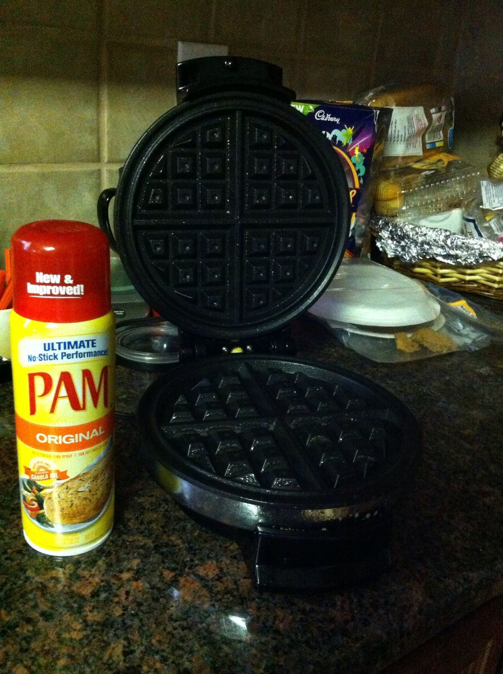 Heating up the waffle maker. Good old PAM make the process a lot easier :D