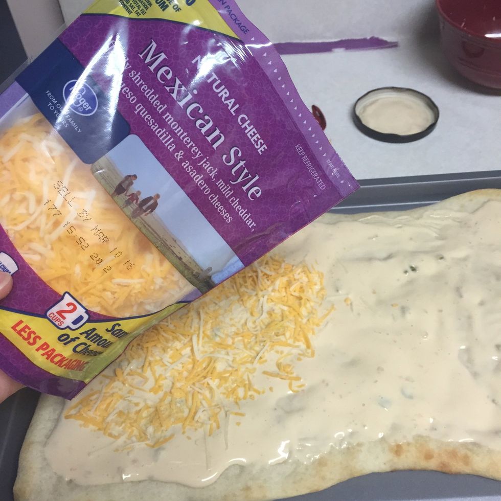 Heavily layer cheese next