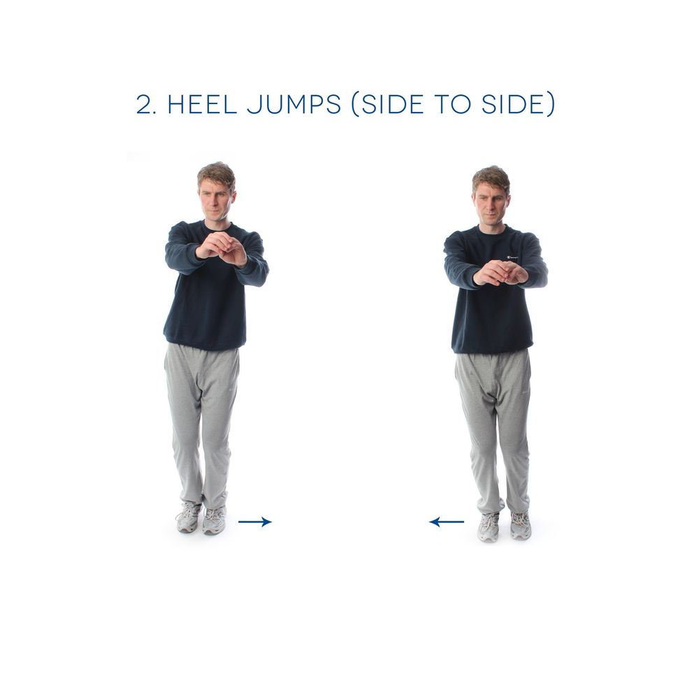 Heel Jumps (side to side) - Stand up straight with your legs together and arms out in front. Bounce on your heels moving them side to side for 1 minute