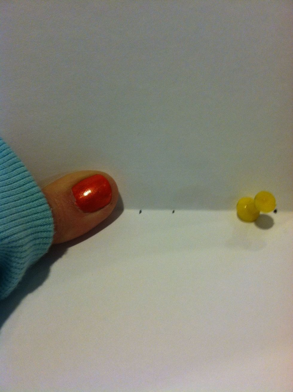 Held the signature and poked holes in all sheets of paper with a tack where I marked out.