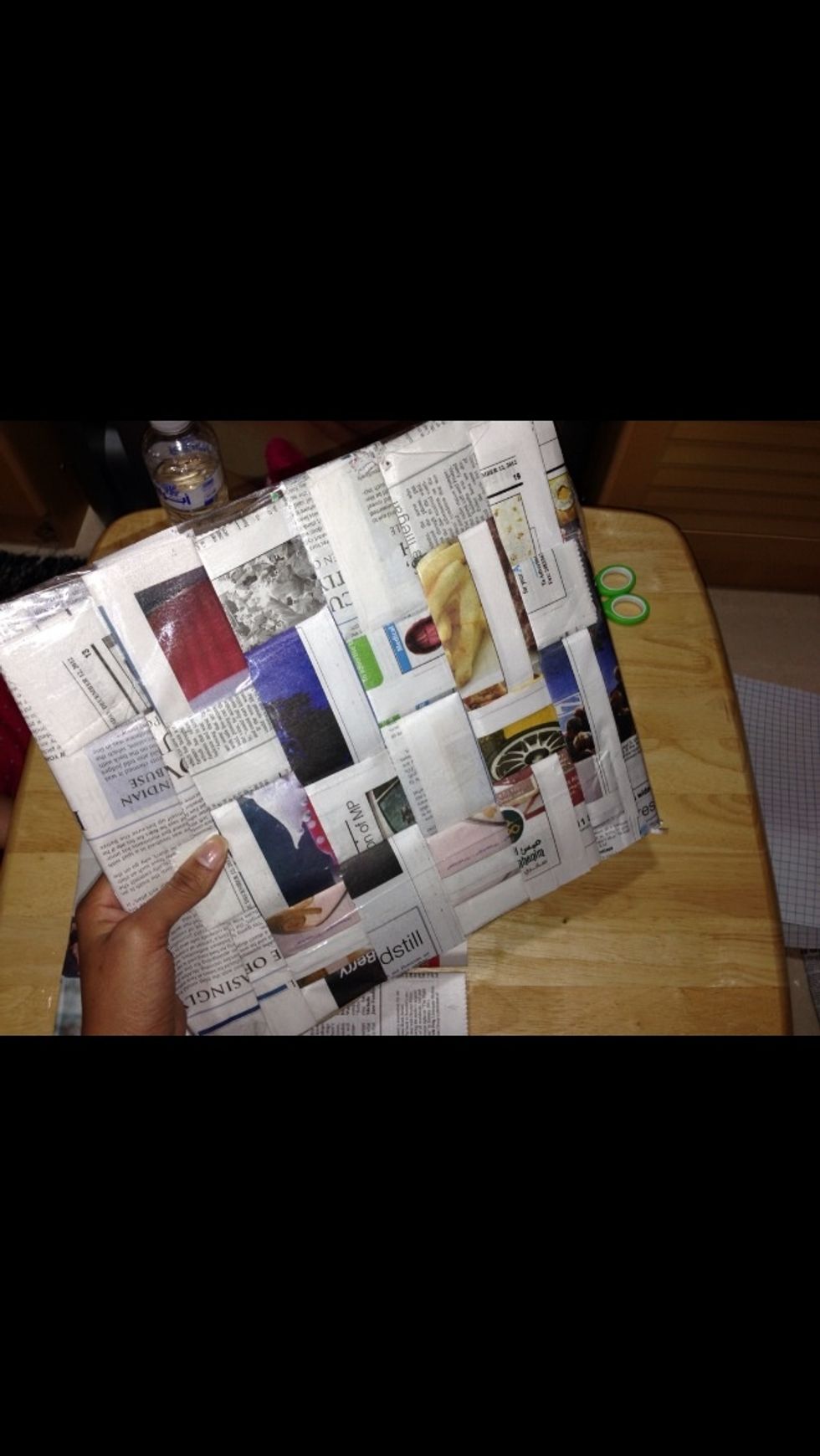 Hello my taped newspaper square which is going to be the base of my box ;)