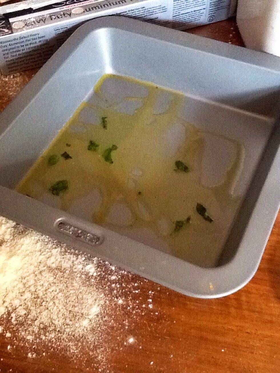 Hen you get the leftover butter from the saucepan and spread it all over your loaf tray