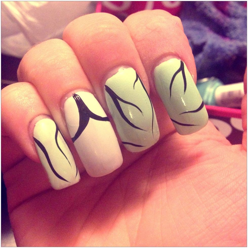 Here add the bangs.   Simply add two curves from the middle out :)