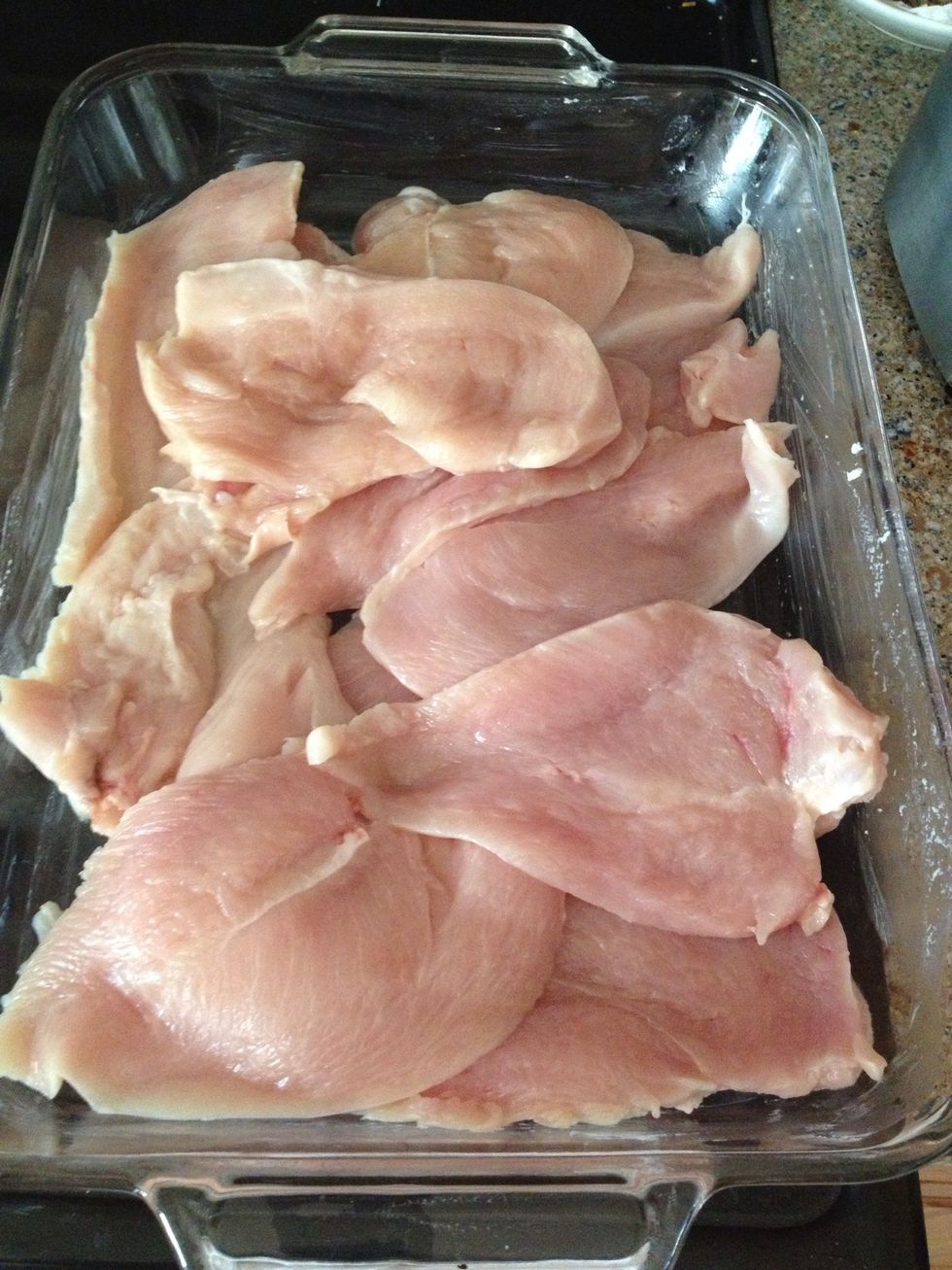 Here are all the chicken breasts halved.