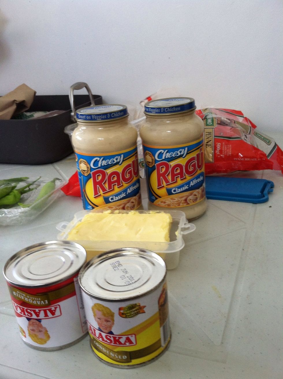 Here are some of the ingredients: 2 bottle of alfredo sauce, butter and 2 evaporated milk