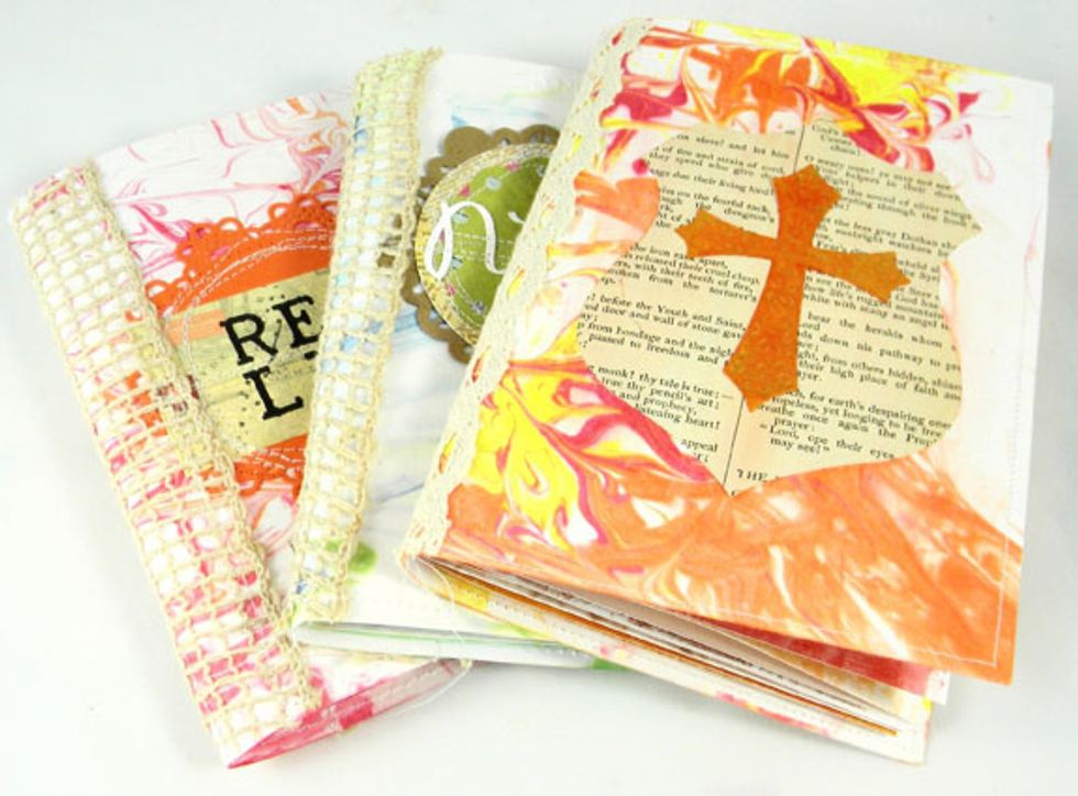 Here are the blue, orange and red journals.  A few of them have the leftover prints that didn't have a place in the colored journals.  They are just as pretty!