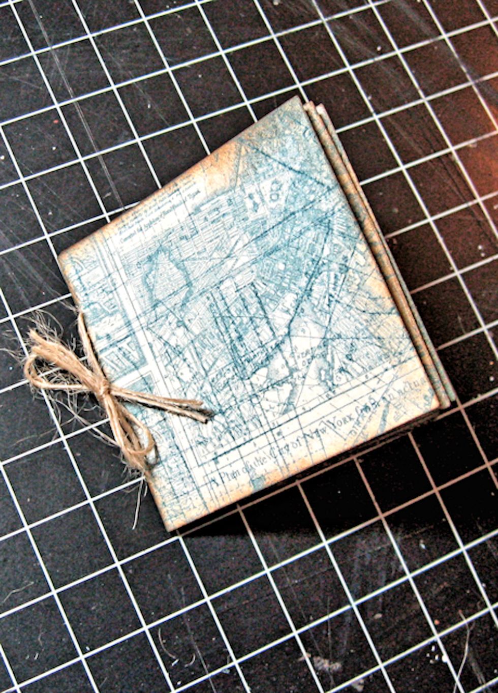 Here are the inner pages all stitched together and tied. Now we will create a binding that will join the inner pages to the front and back cover.