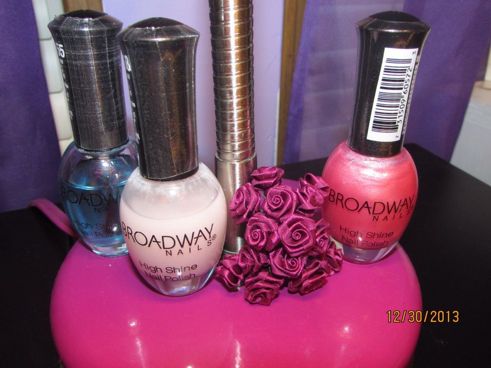Here are the nail polishes I will be using... Top Coat, Base Coat, and Base Color.