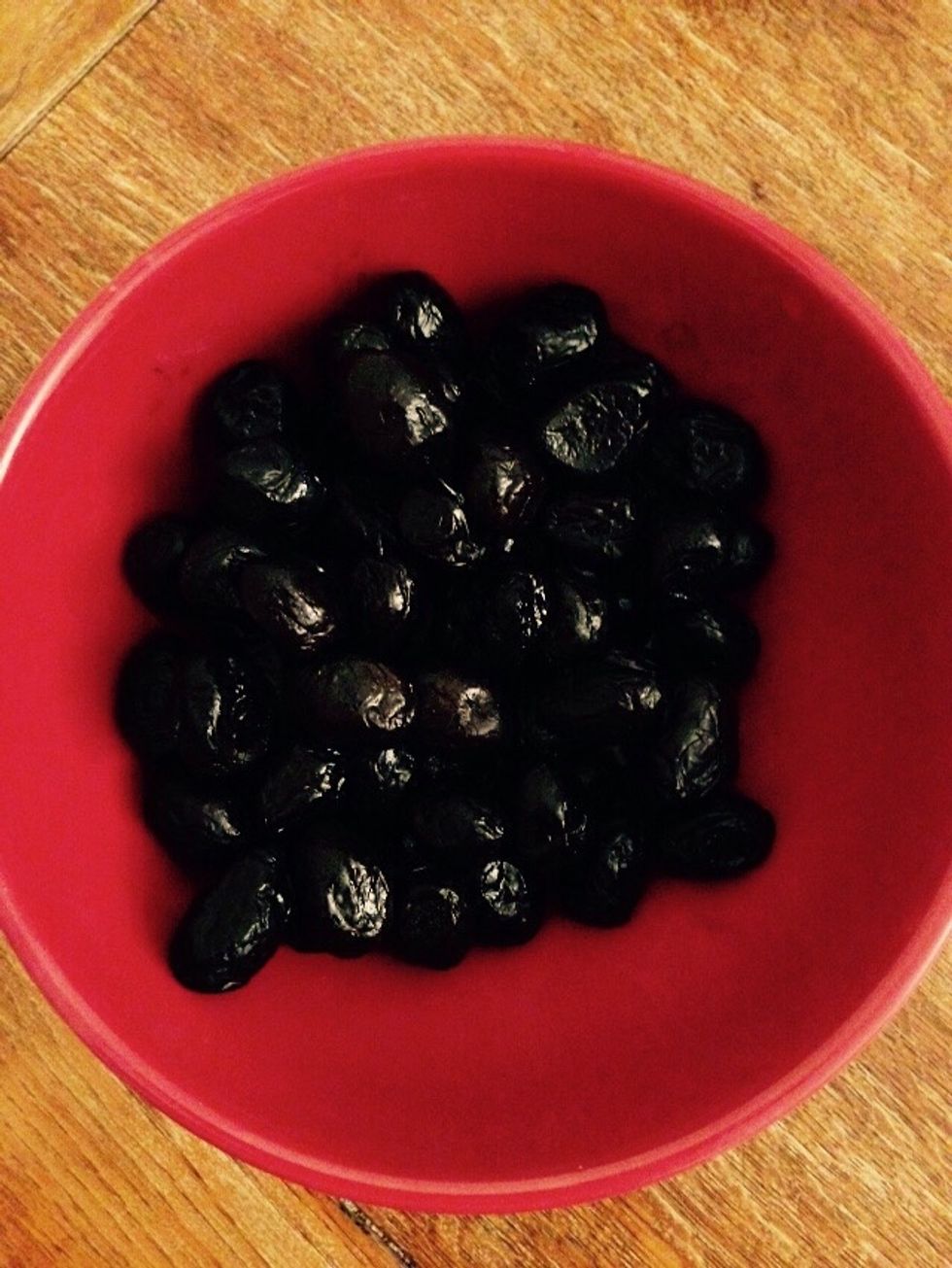Here are the olives, I couldn't find them pitted already, so I will have to pit them myself. You can use kalamata olives instead or green olives, or even mixed ones, whichever flavor you want.