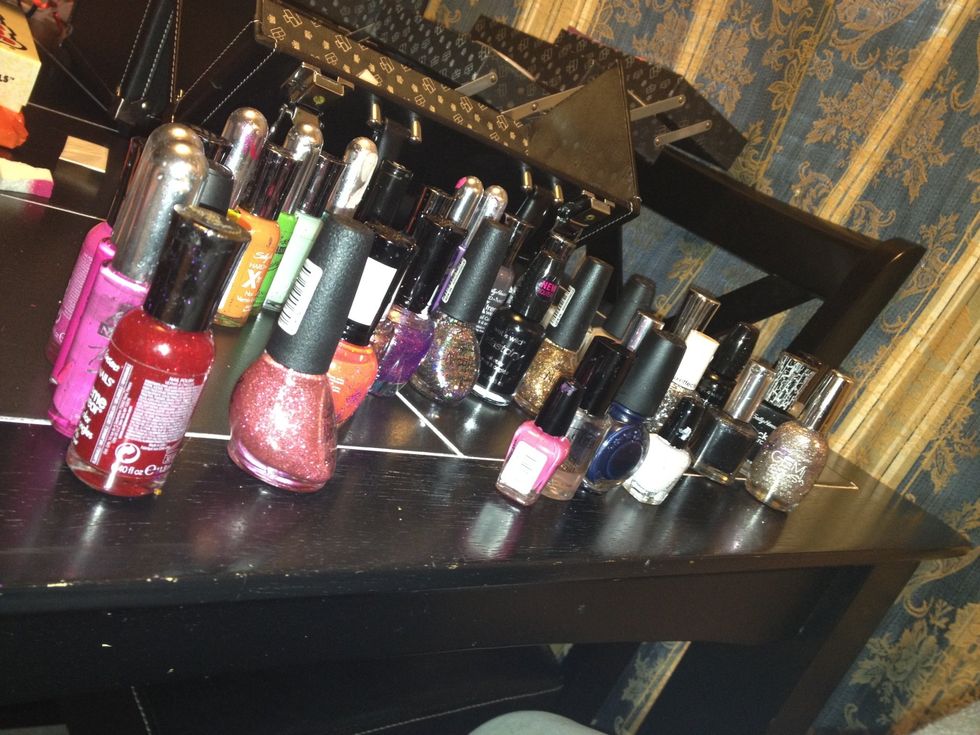 Here are the polishes I keep on hand. About 75 of them. I have about 400 at my salon. I make sure to have primary colors, black, white, topcoat, and Konad special polish..