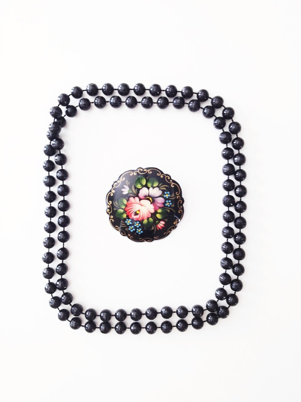 Here are the supplies. You can use any colour of beads and any style brooch...it's up to you! My beads are literally ones I used to play with as a kid.