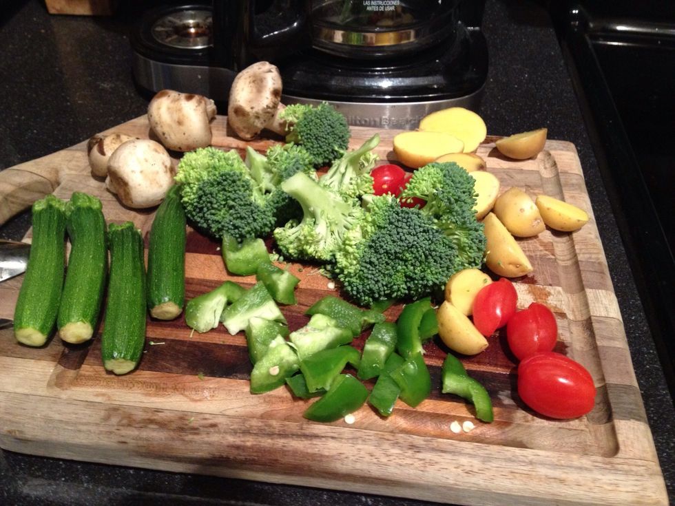Here are the vegetables I'm using: Zucchini, small potatoes, grape tomatoes, broccoli, and green bell pepper. Adjust the amount to whatever you feel like. You can use whatever. I used mushrooms later
