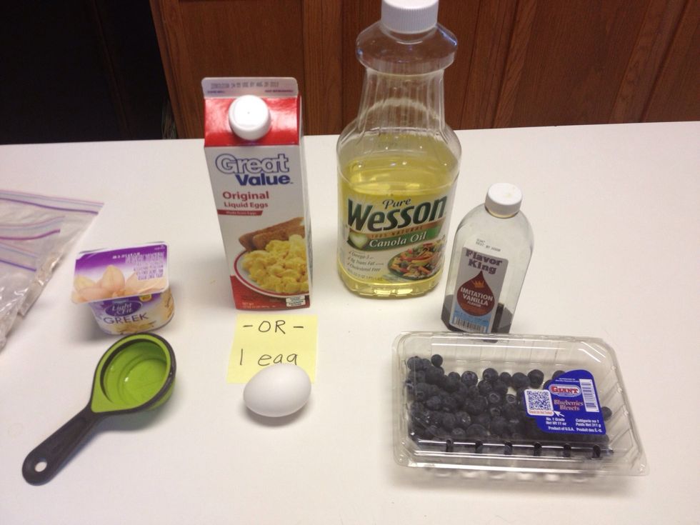 Here are the wet ingredients. When I make a double batch, I only use 4oz. Of yogurt and eat the rest while I'm cooking. If you use liquid eggs, you need 2 TBS for one egg. Blueberries I ADD LAST.