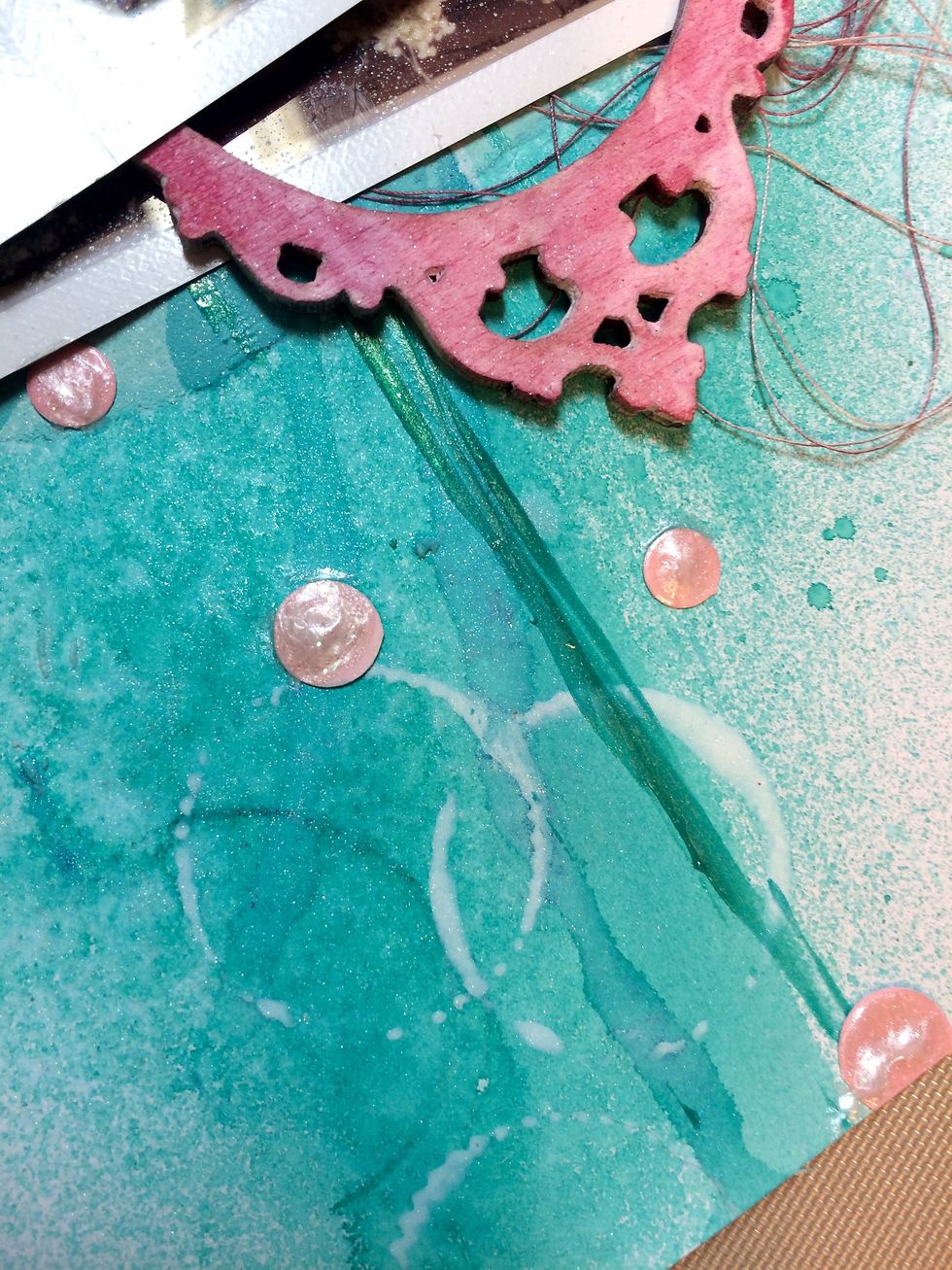 Here are those flat pink circles but now they are dimensional and sparkly because I put some Frost Clear Coats on them.