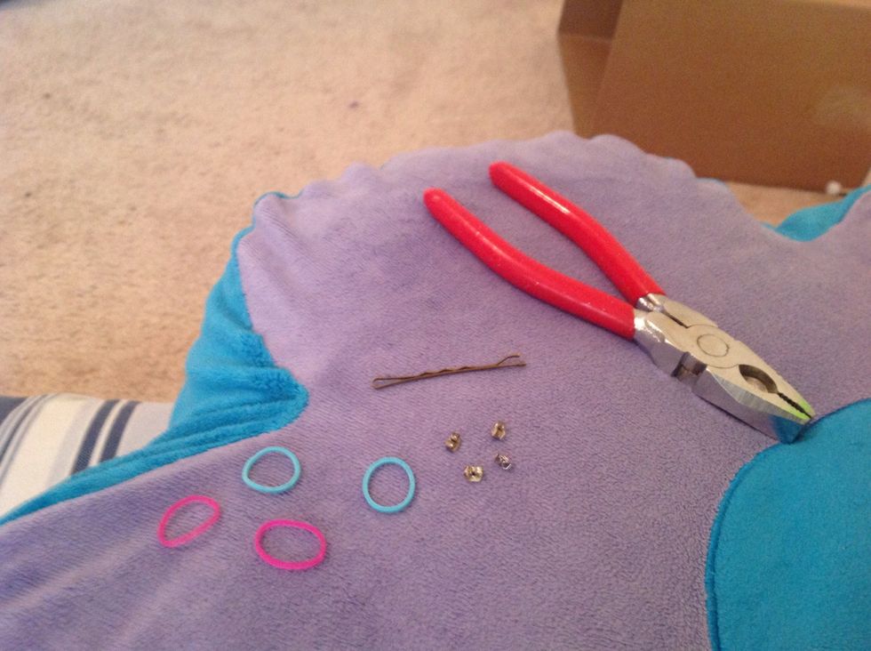 Here are your supplies. Players, bobby pin, 4 clean earring backs, and 4 rainbow loom bands. Any color