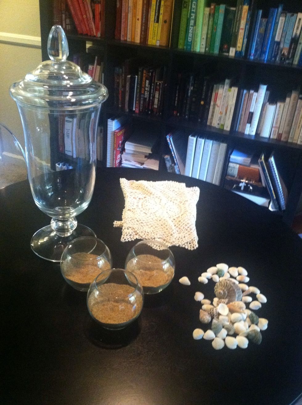 Here are your supplies. You can find these jars at HomeGoods anytime. The sand and shells are from Joann's but check your Dollar Store. The runner is from Etsy - you can use any you like.
