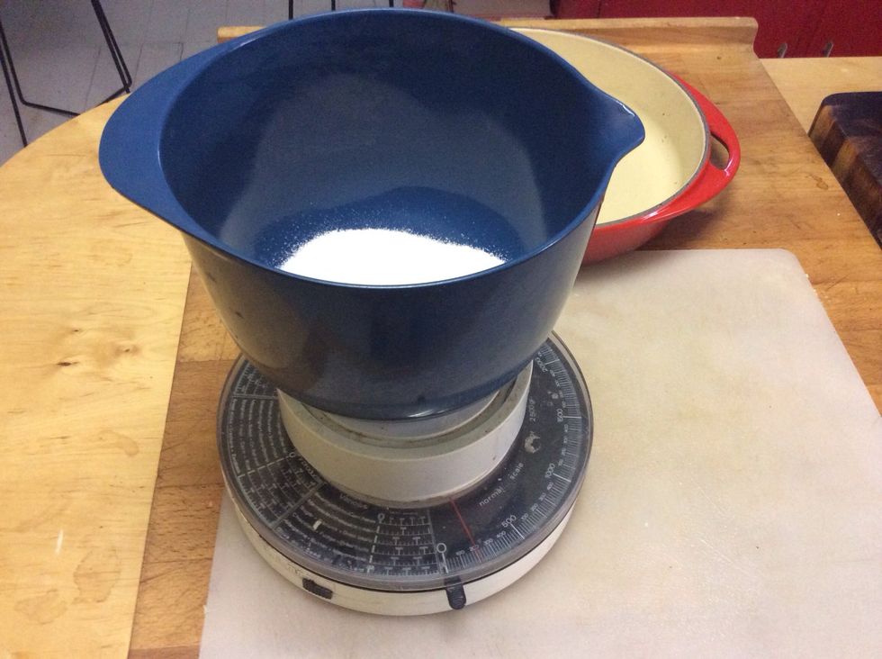 Here comes the fun bit - caramelisation! Measure out 200g white sugar in the medium bowl, and pour it into your tatin pan/frying pan