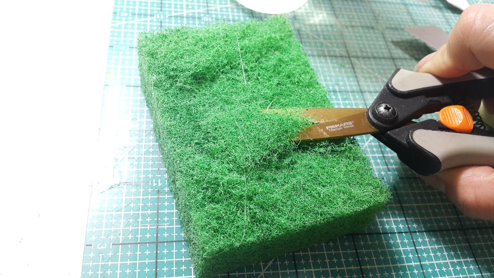 Here for the grass, it is amazing, just cut a thin layer from scouting pad and stick onto the garden, you can put one or two layers.