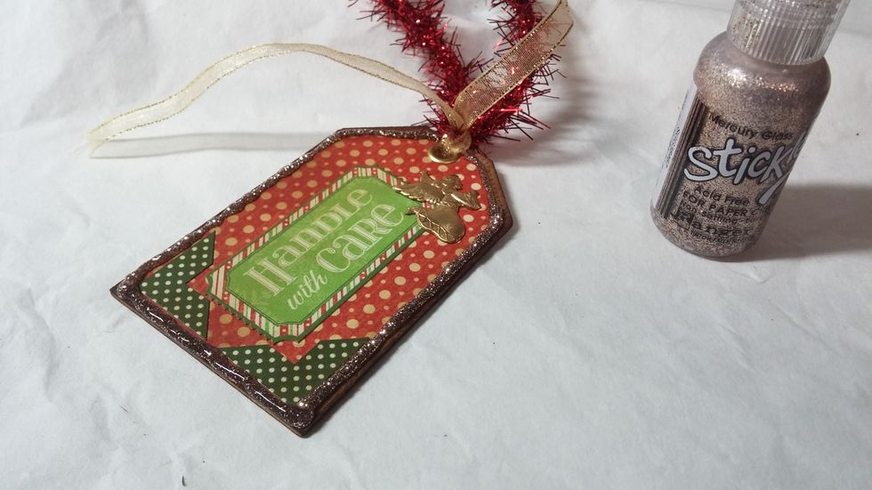 Here I added another layer of media and got some stickels glitter glue in the mix.