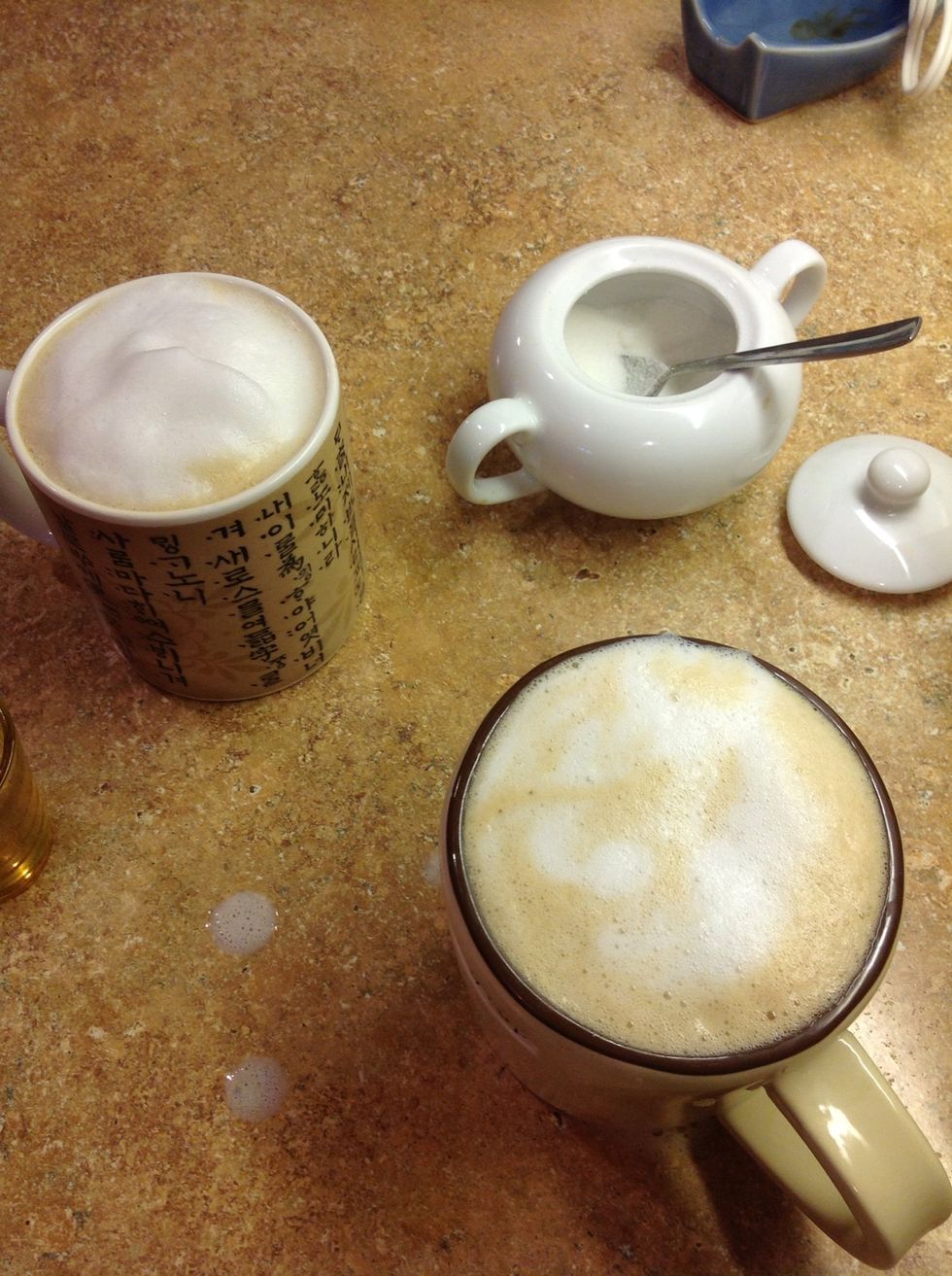 Here I added half-and-half, as well as the milk and foam I made earlier. With the six shot pot I usually make two 3-shot cups of coffee, but you could also make three 2-shot cups. Enjoy!