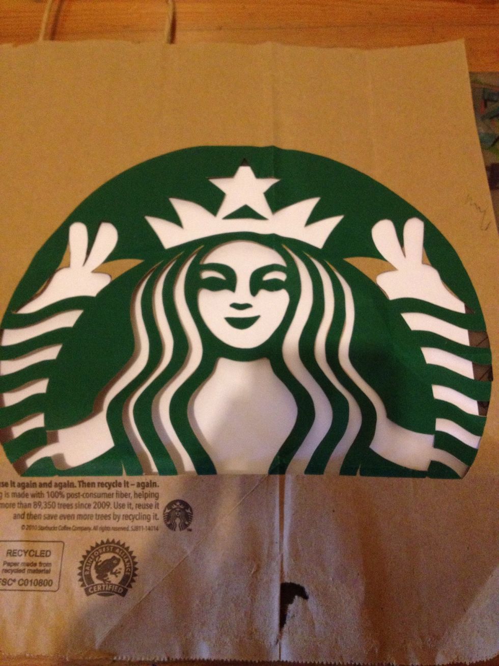 Here I already cut out my stencil n I added a little touch. She's throwing up peace signs.