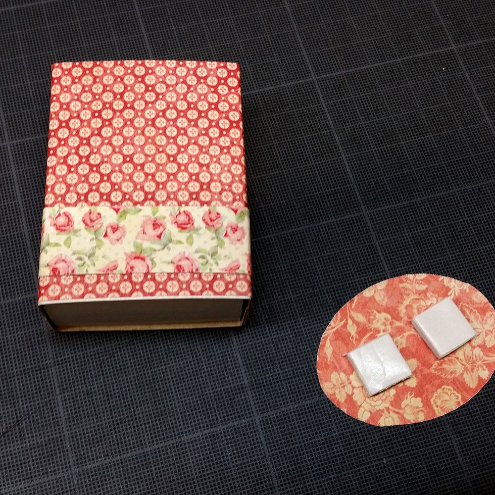 Here I cut out a motif I liked, and added som 3D foam dots to it.