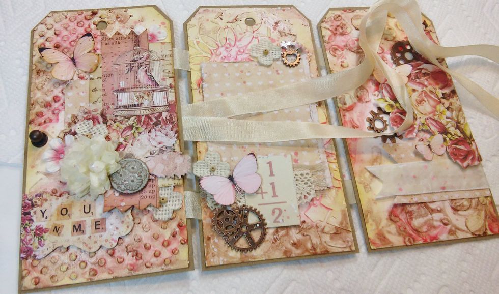 Here i just pulled the ribbon in between the tags to the front.