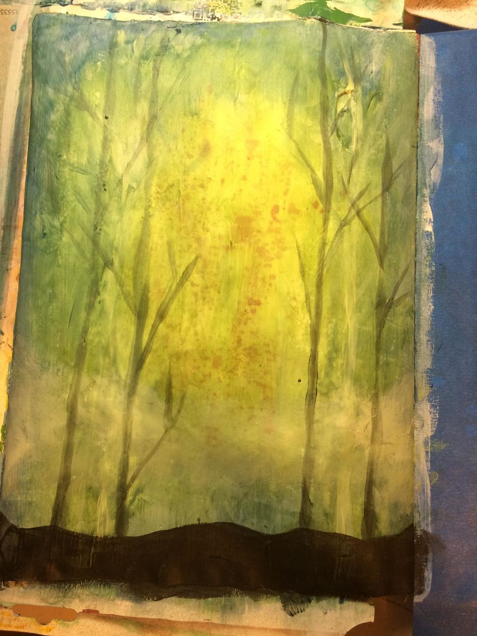 Here, I'm adding in darker trees, which bring them closer to the forefront.  I'm also painting in the ground with Tuxedo Velvet.