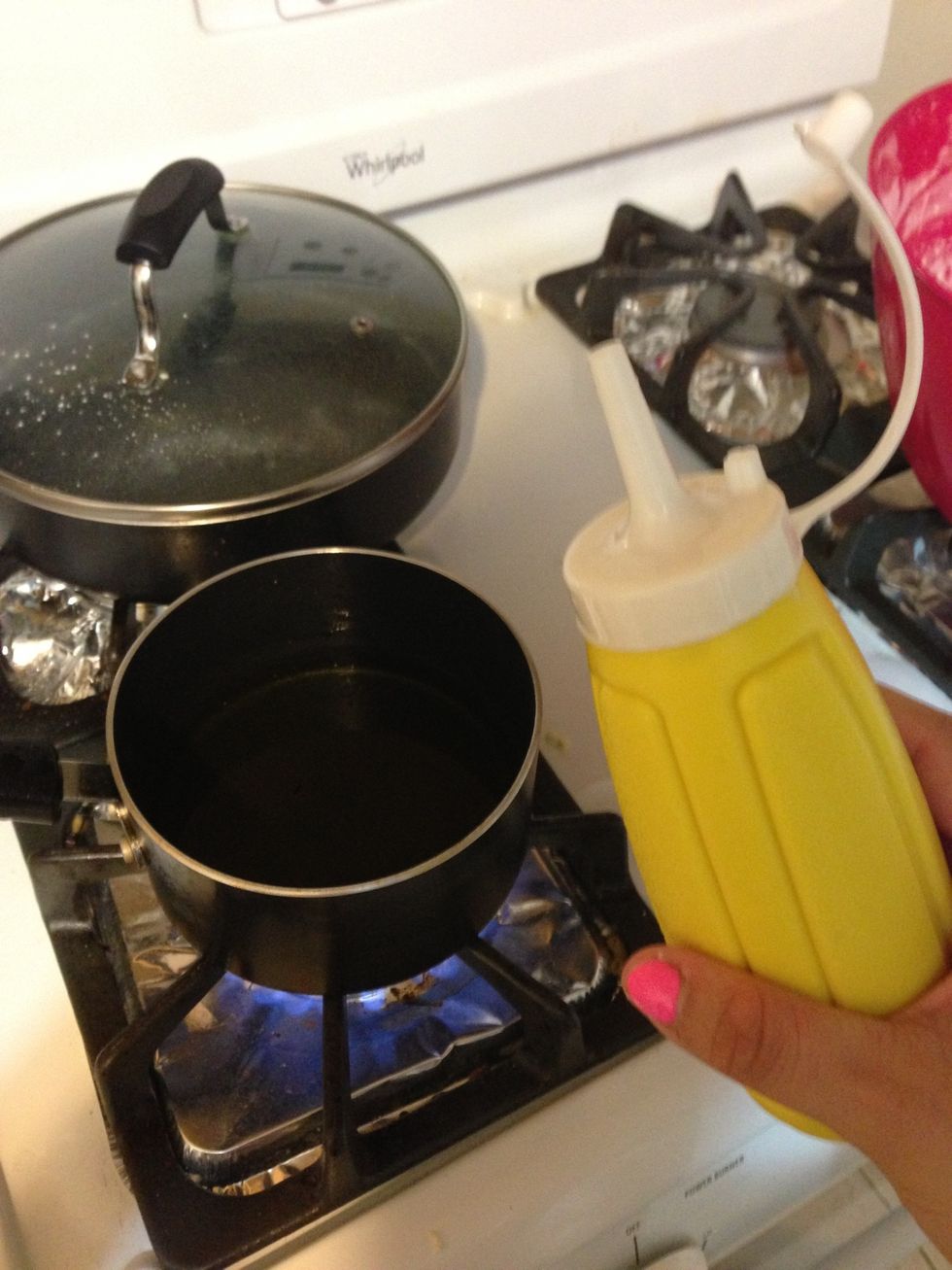 Here I poured the batter into this mustard bottle. I also recommend using an empty ketchup bottle. NOTE: if using this do NOT apply to much pressure when squeezing! It can burst and be dangerous!