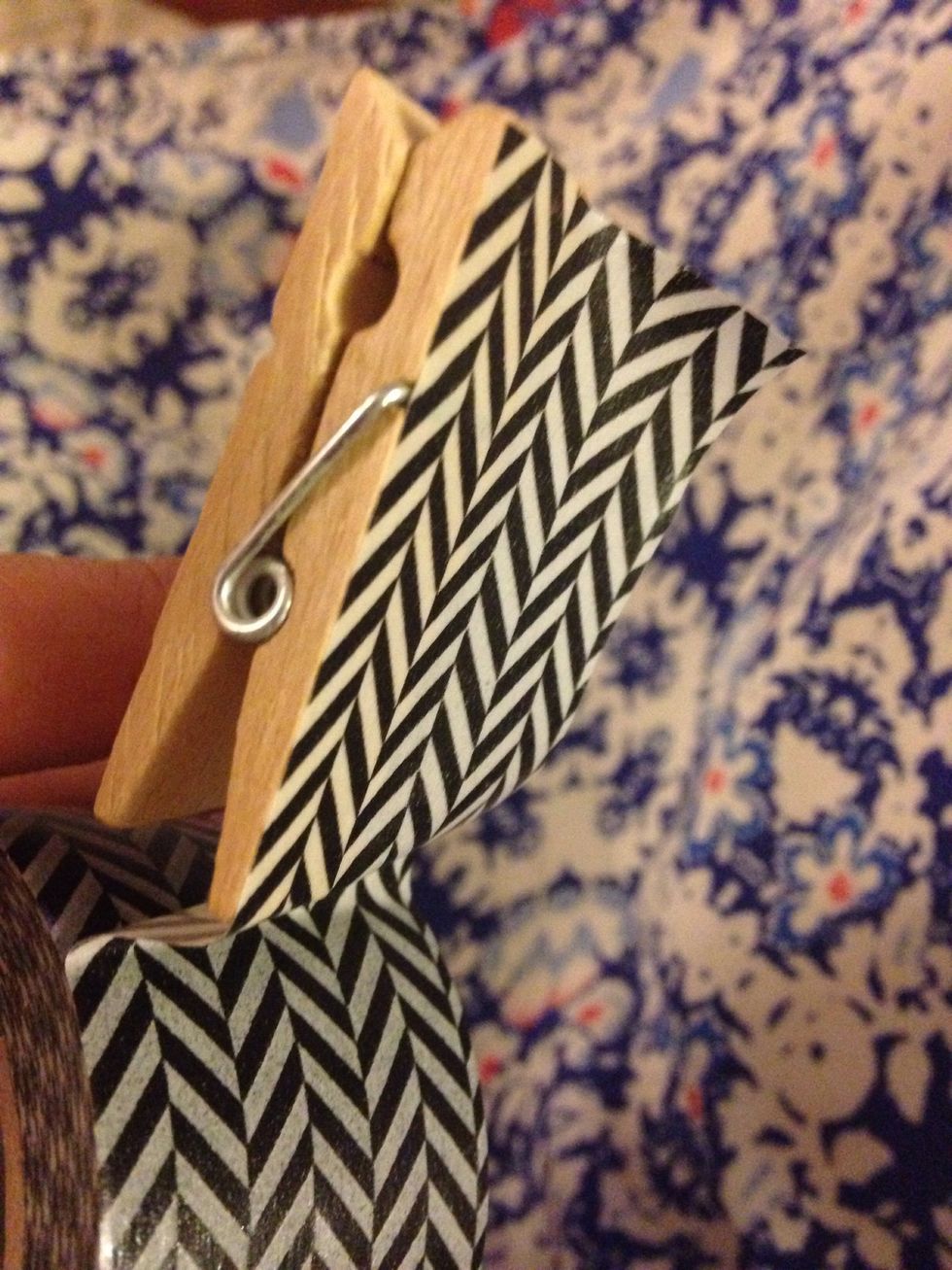 Here I used a different pattern washi tape and it's a bit wider. So I lined up one side of the tape on the clothespin.