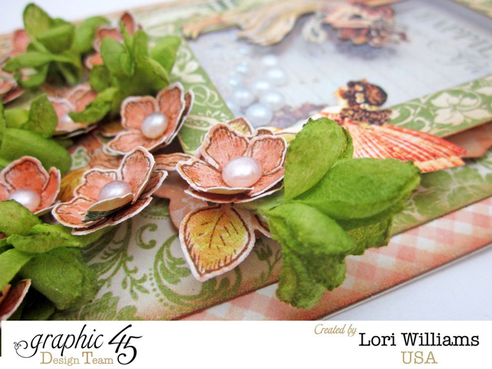 Here is a close up of the flowers and also the window in the background showing you the depth and the pearls and  glitter in the inside.