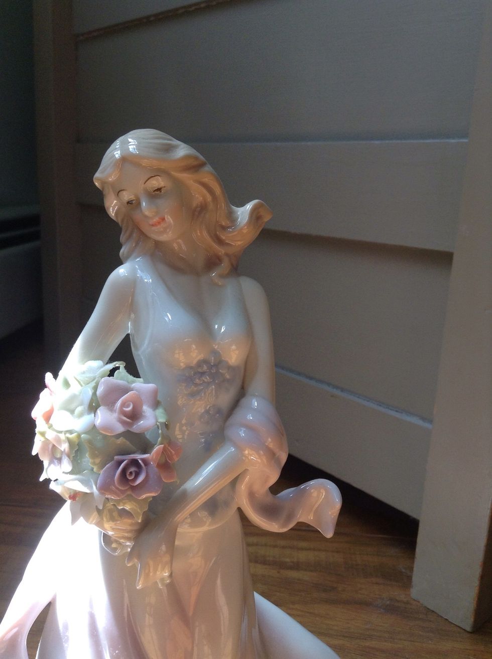 Here is a good angle, but the subject isn't placed in the shot right. Because her head is tilted to the left, the shot should be moved more to the left.