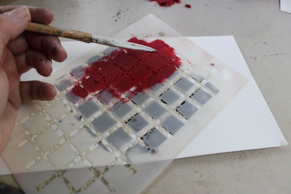 Here is a photo of the technique I use to apply the products over the stencils. I always go in one direction when applying the product. So for example only go from top to bottom or from left to right.