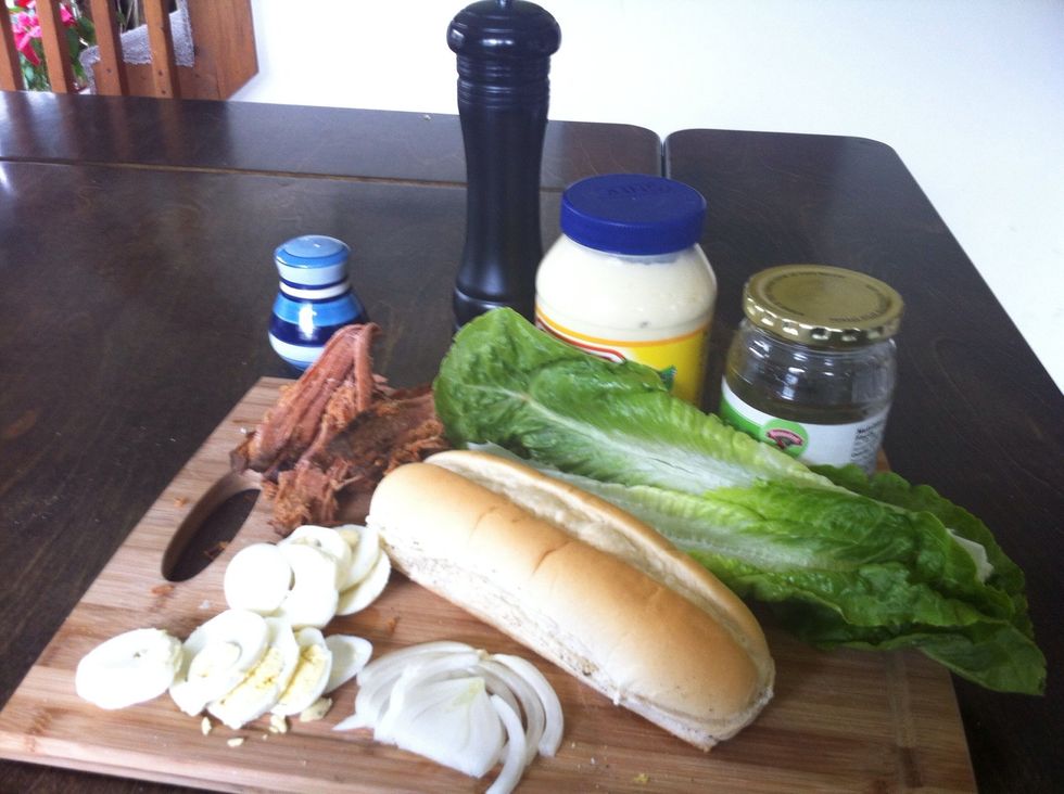 Here is all the ingredients. Really you can use any kind of bread and fixings.   The important parts are Ham, mayo, relish, pepper salt and bread.  I do like the hard boiled egg to.  That is up to you