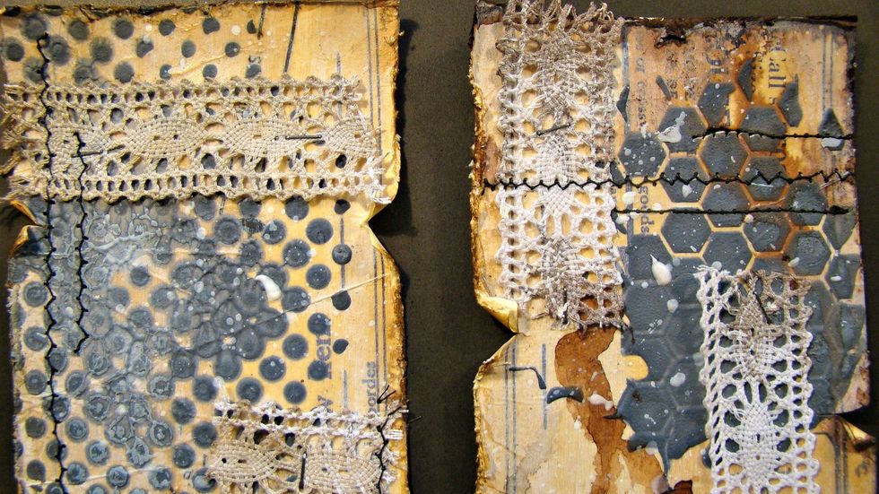 Here is another close up of the distressed edges with the coloration sprays adding so much lovely color. Do some random machine sewing on your tags for interest.