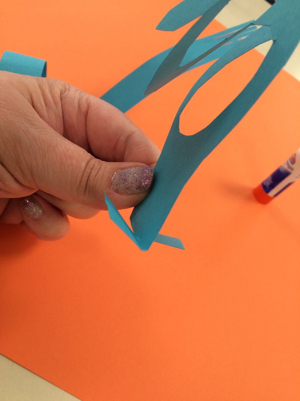 Here is another type of tab - you may to split the tab in half and glue in two spots.