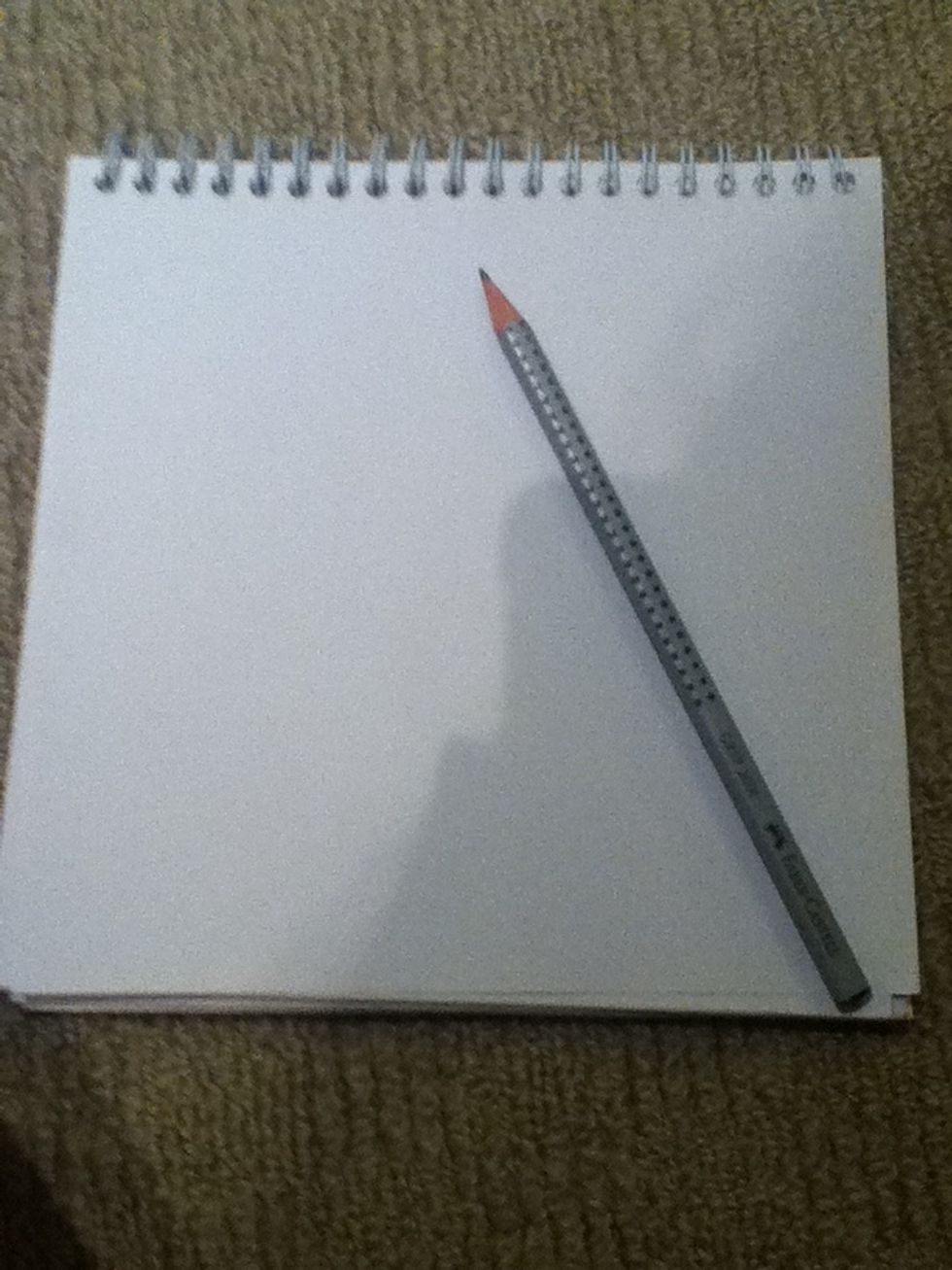 Here is my guide to drawing a very simple cartoon dog.