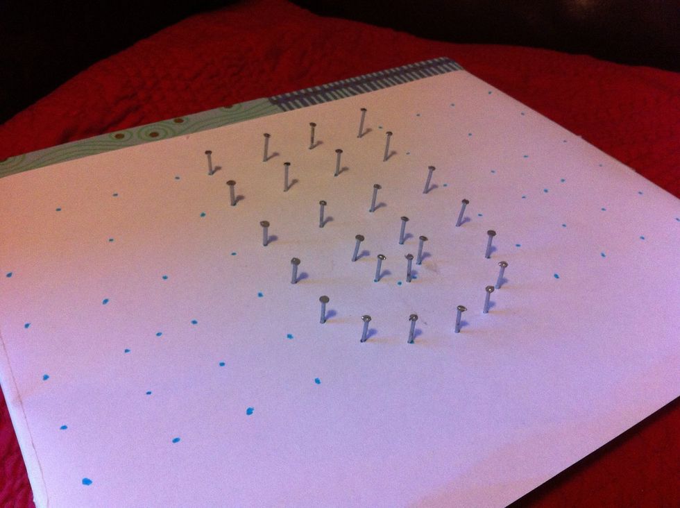 Here is one completed letter, as you can see I've decided to simplify the inside of the U as it would have been a bit crowded otherwise. Any nails that are leaning can be knocked back in to line.