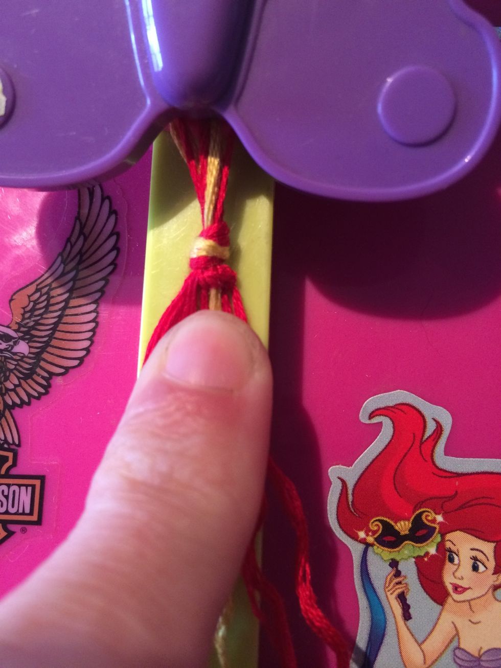 Here is the 1st row. Don't worry if your row looks a little funny, it's because of the beginning knot. Now let's work on the 2nd row.