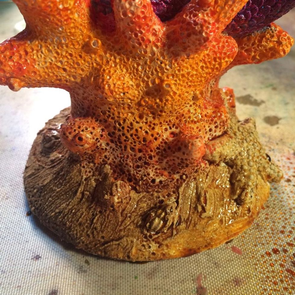 Here is the base. I first brushed on a heavy layer of Stone Elements in Bone then dried it with my heat gun. Then I grabbed my Colorations Spary in warm and misted heavily.