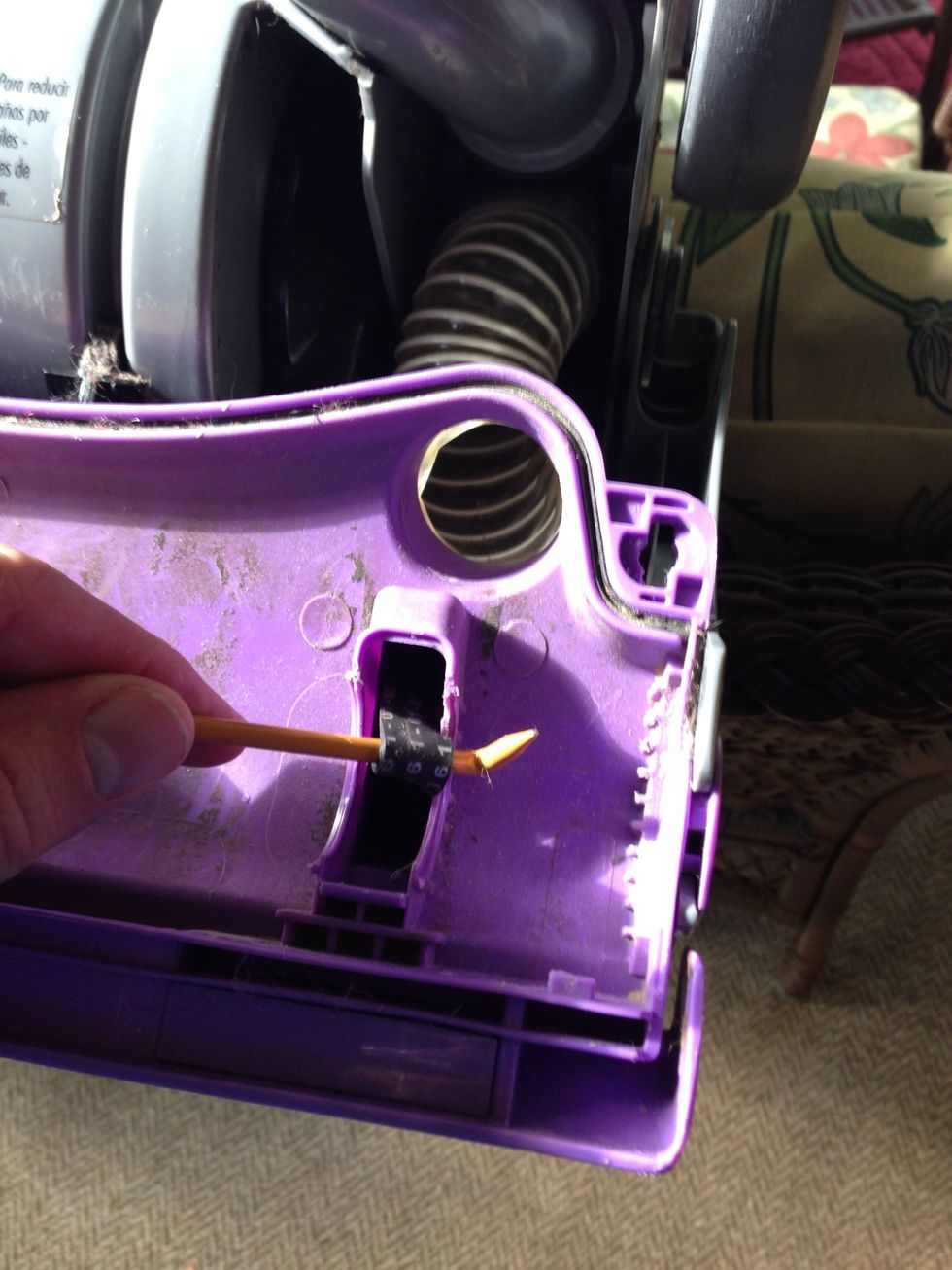 Here is the belt tool fishing out the belt. The belt is much too short and tight to fit the roller brush under so you need the tool kit.