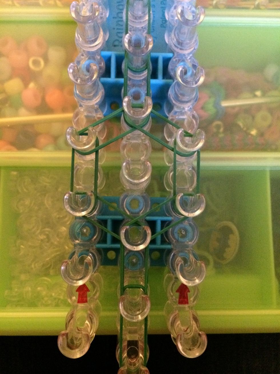 Here is the complete circle. Grab one more green band.
