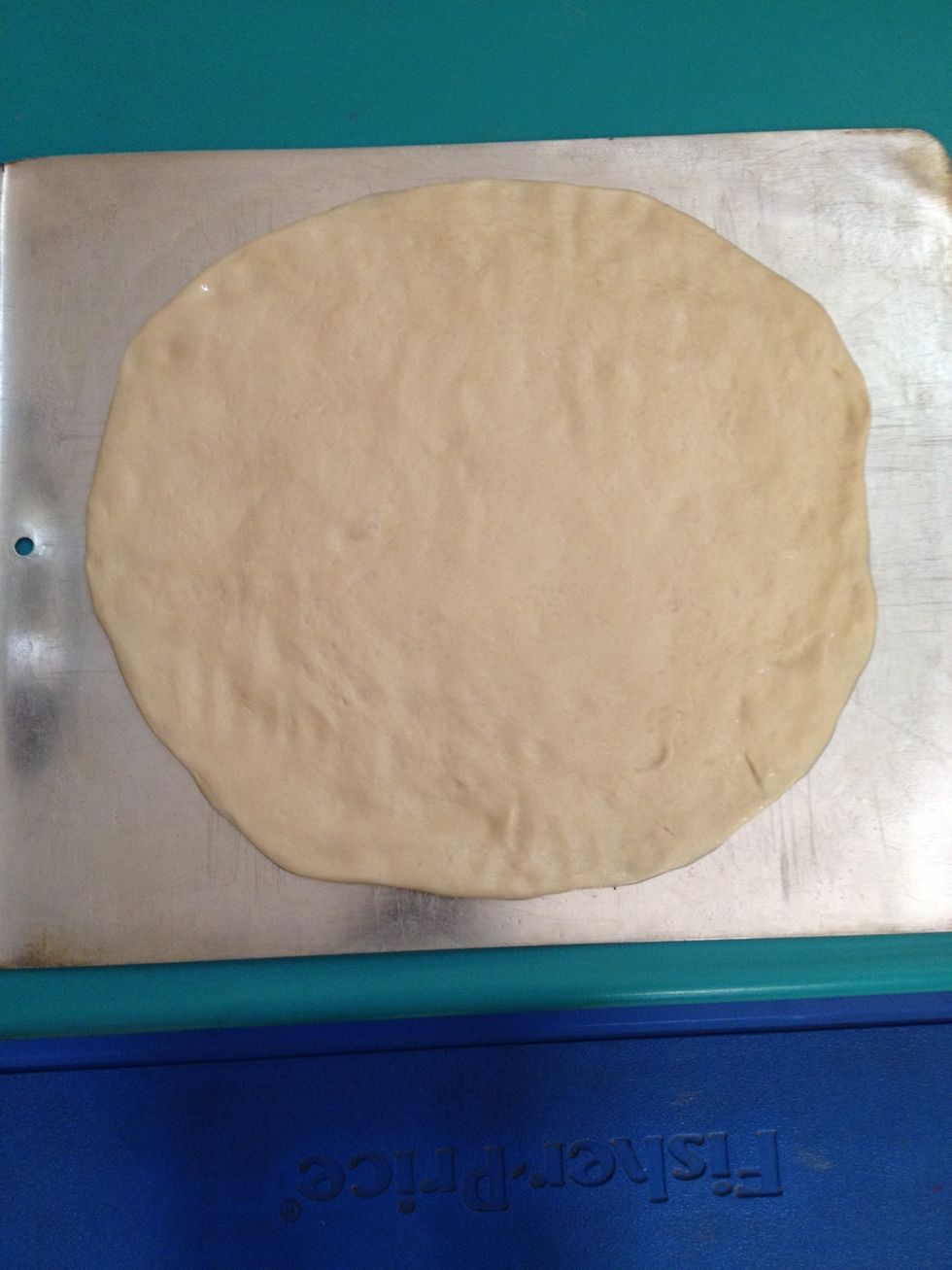 Here is the dough all pressed out into a circle
