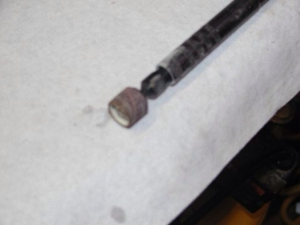 Here is the Dremel tool with a sanding drum attached.  I do all the carving with this tool.  A flex shaft makes it easier to maneuver.