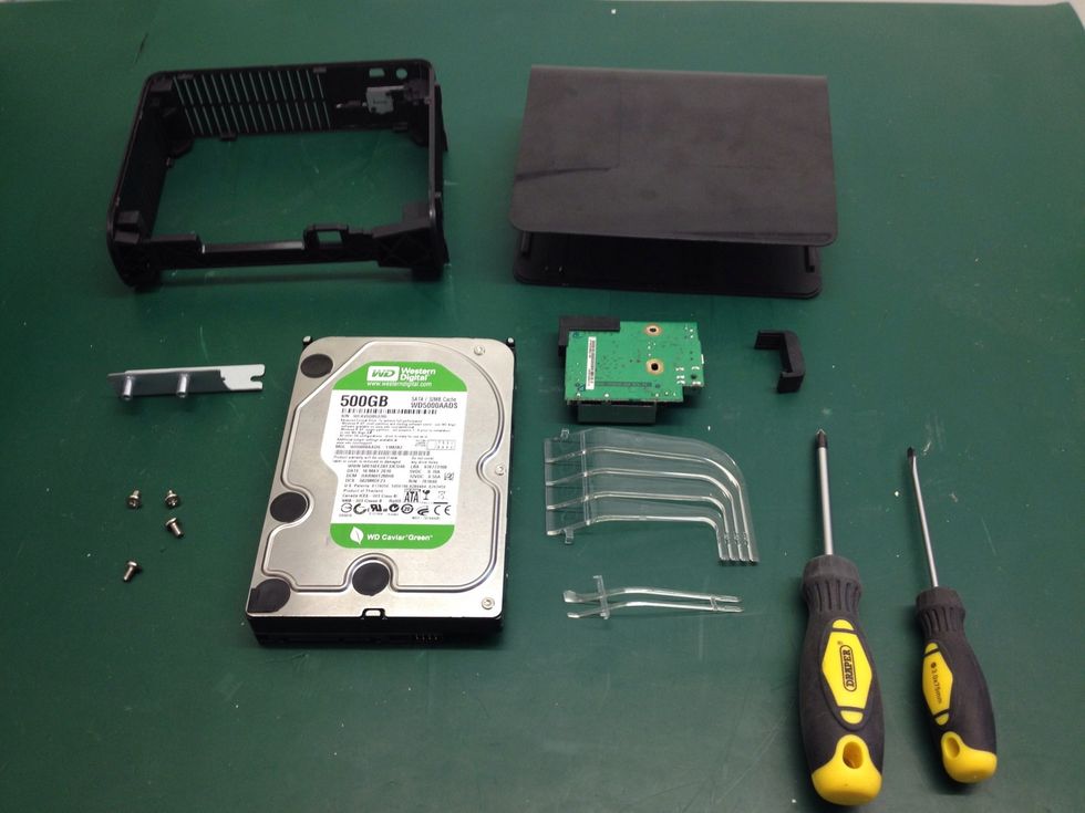 Here is the enclosure fully disassembled for your viewing pleasure. To put it back together follow the previous steps in reverse.